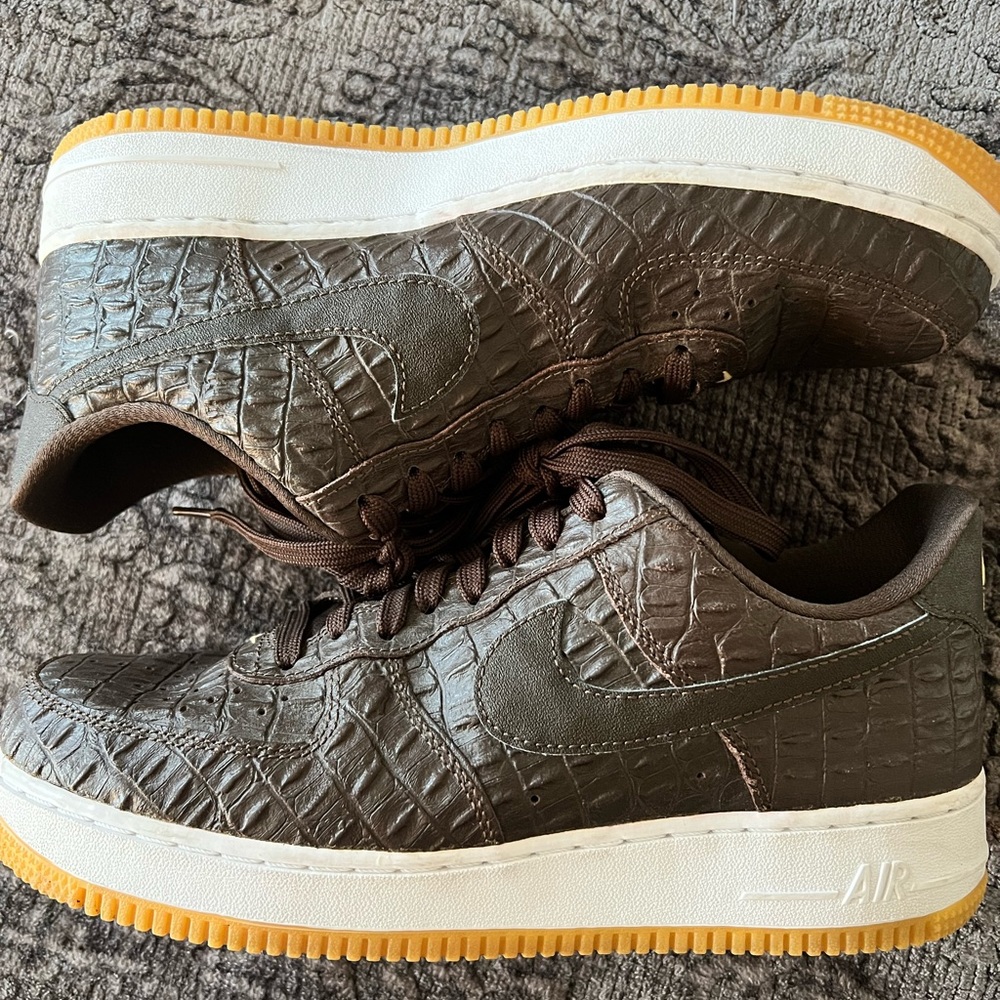 Brown perforated leather with gold Nike Air details